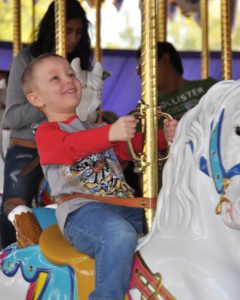 Disney PhotoPass Captures my son enjoying the carousel.